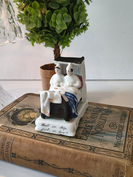Antique German Fairing Figurine ‘Shall we sleep first, or how?’