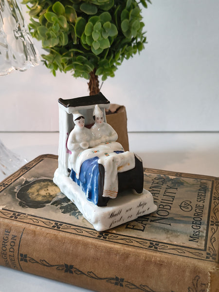 Antique German Fairing Figurine ‘Shall we sleep first, or how?’
