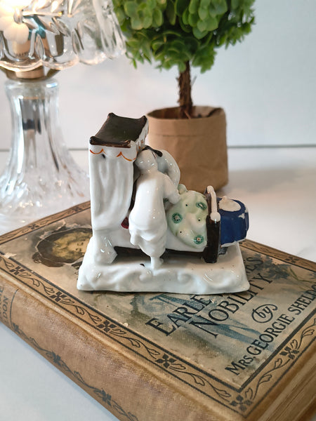 Antique German Fairing Figurine 'The Last In Bed To Put Out The Light'